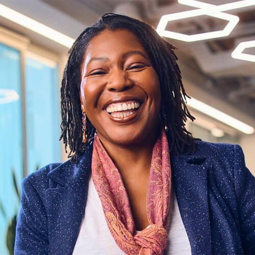 A woman smiles